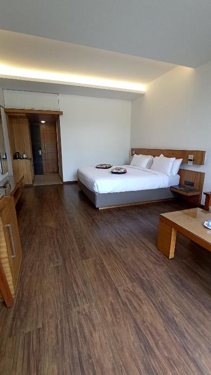 Postel nebo postele na pokoji v ubytování Mountain Retreat Kodai