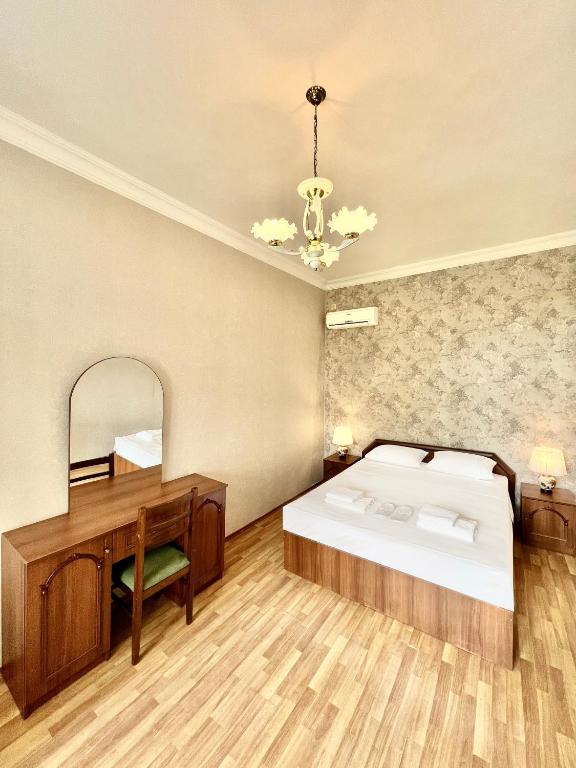 Postel nebo postele na pokoji v ubytování Savane hotel
