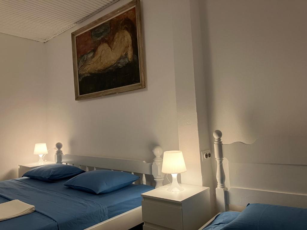 Postel nebo postele na pokoji v ubytování Hidden Gem Hostel