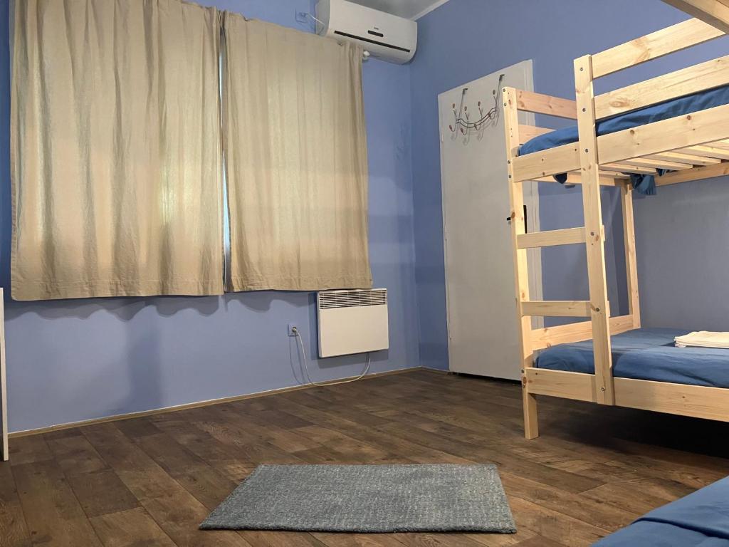 Postel nebo postele na pokoji v ubytování Hidden Gem Hostel