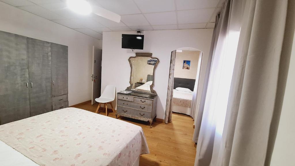 Postel nebo postele na pokoji v ubytování Fonda Toldra