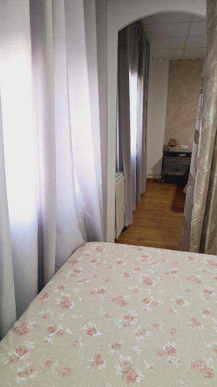 Postel nebo postele na pokoji v ubytování Fonda Toldra