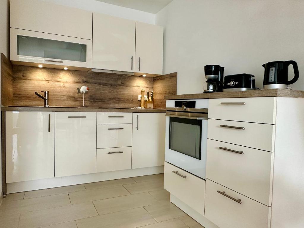 Kuchyň nebo kuchyňský kout v ubytování Ferienwohnung in Timmendorfer Strand, Niendorf an der Ostsee