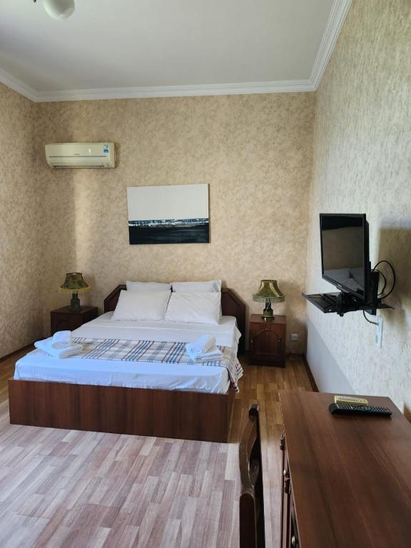 Postel nebo postele na pokoji v ubytování Savane hotel