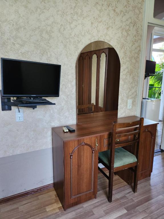TV a/nebo společenská místnost v ubytování Savane hotel