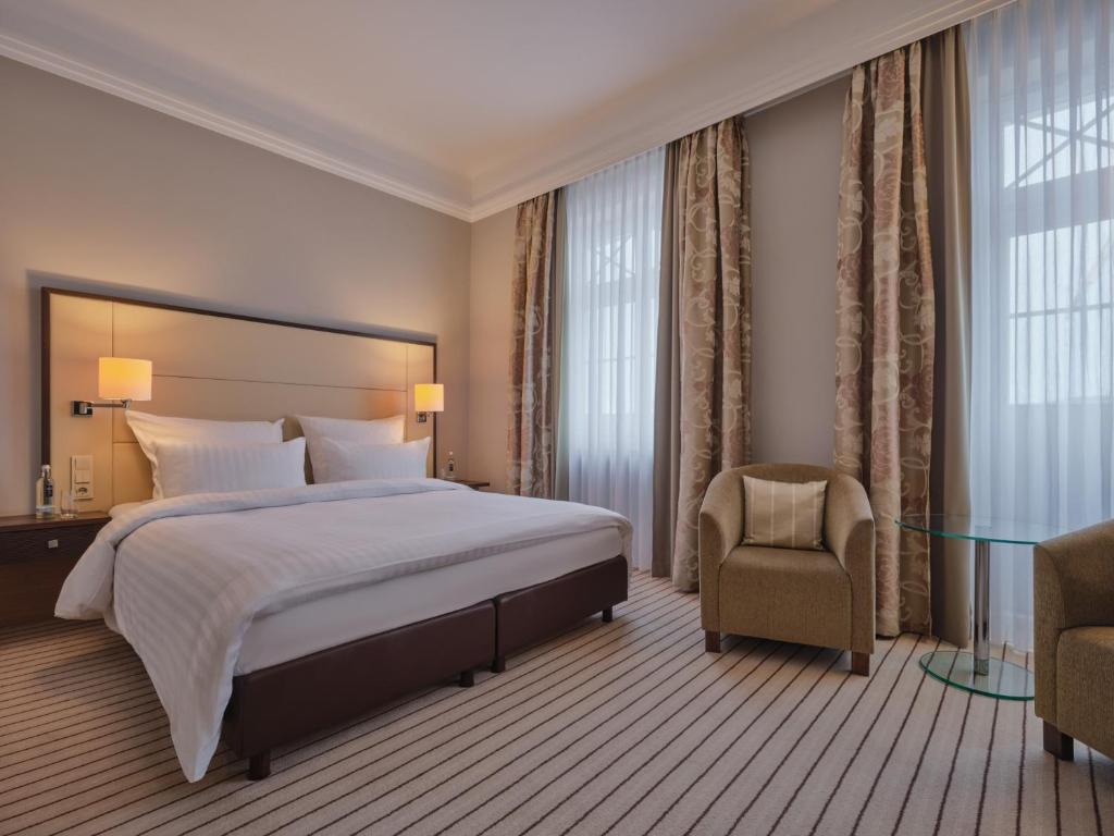 Postel nebo postele na pokoji v ubytování Steigenberger Hotel Bad Neuenahr