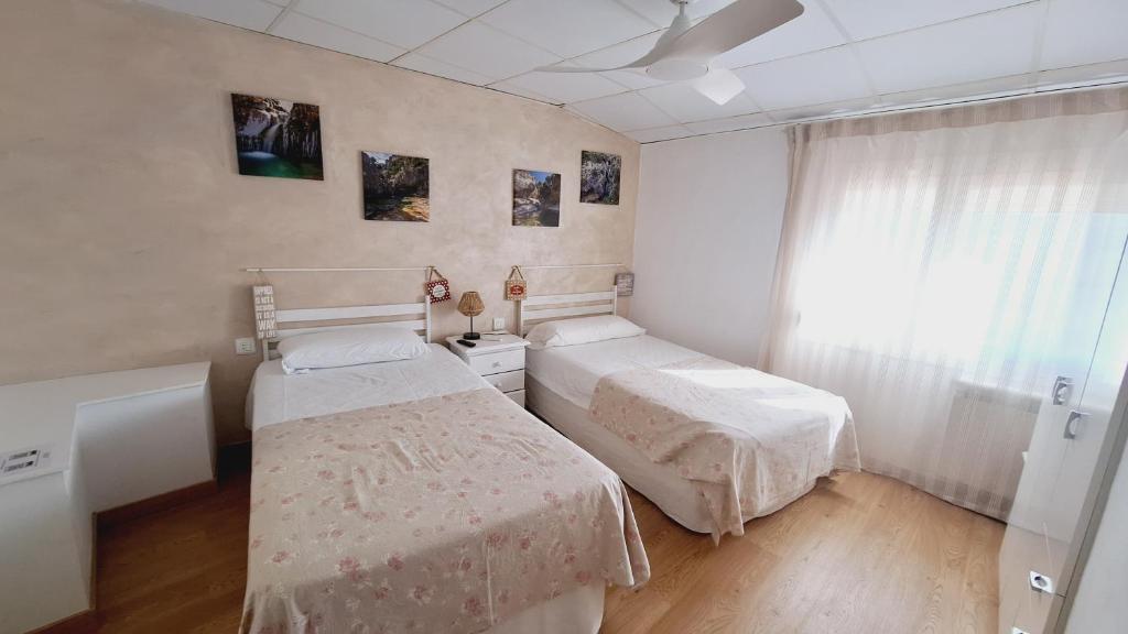 Postel nebo postele na pokoji v ubytování Fonda Toldra