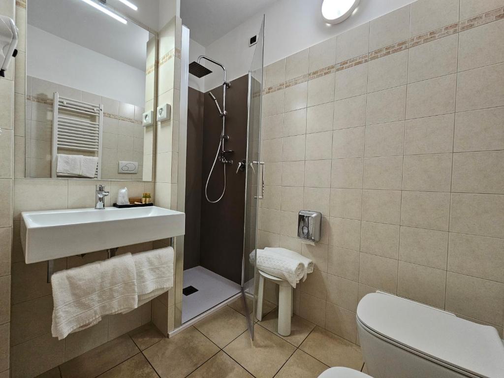 Koupelna v ubytování Hotel Cladan