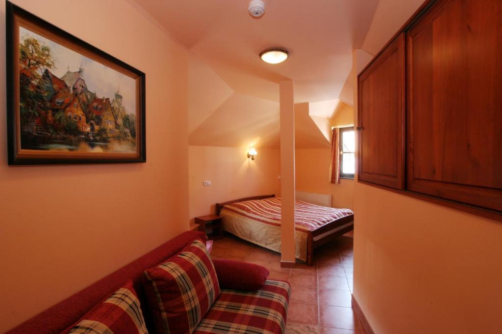 Een bed of bedden in een kamer bij Betlem Club Hotel