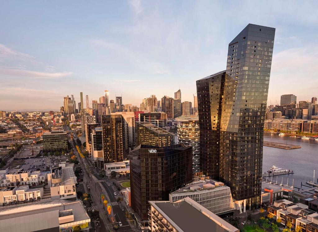 an aerial view of a city with tall buildings at Vibe Hotel Melbourne Docklands in Melbourne