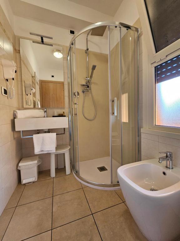 Koupelna v ubytování Hotel Cladan