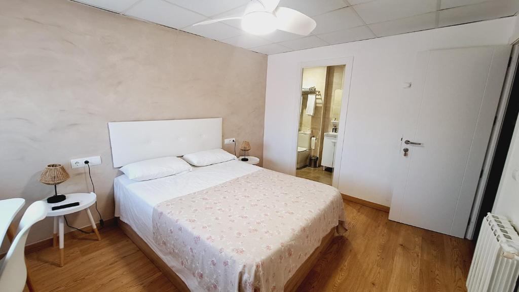 Postel nebo postele na pokoji v ubytování Fonda Toldra