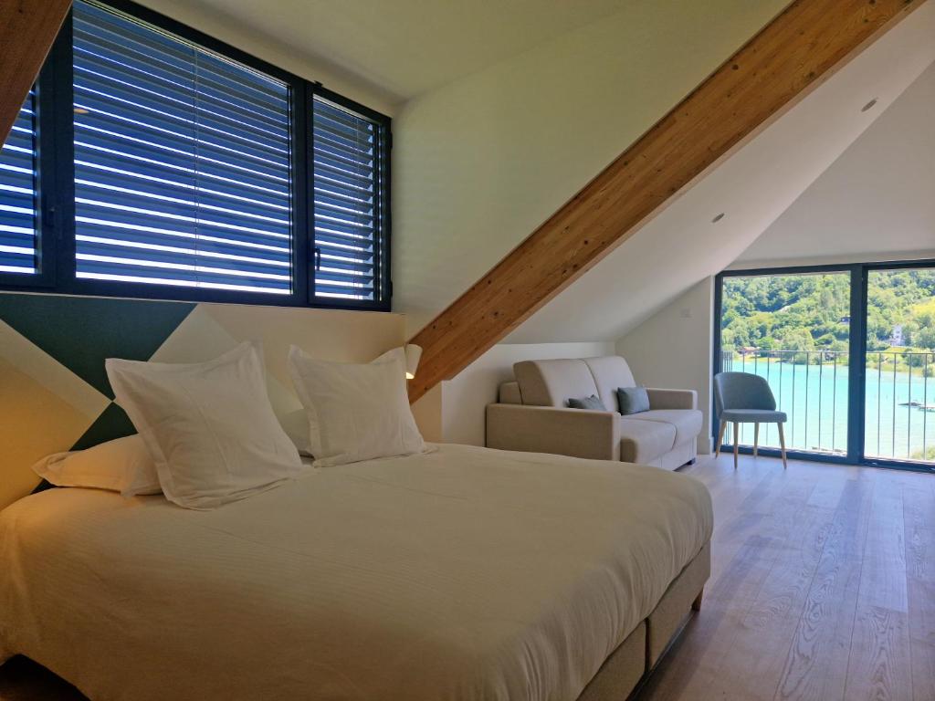 Postel nebo postele na pokoji v ubytování Beau Rivage
