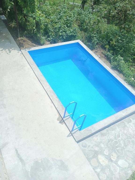 Bazén v ubytování Зелений Рай nebo v jeho okolí
