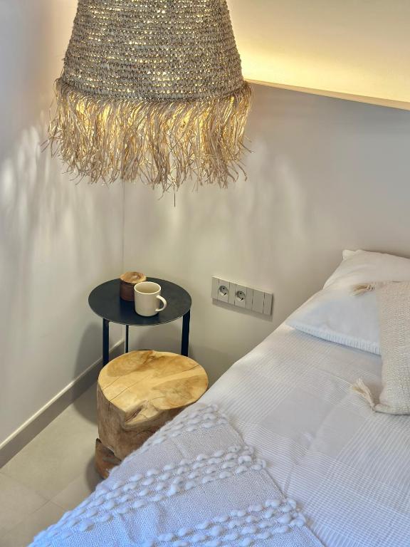 Postel nebo postele na pokoji v ubytování CAL PASSACOSTES cb