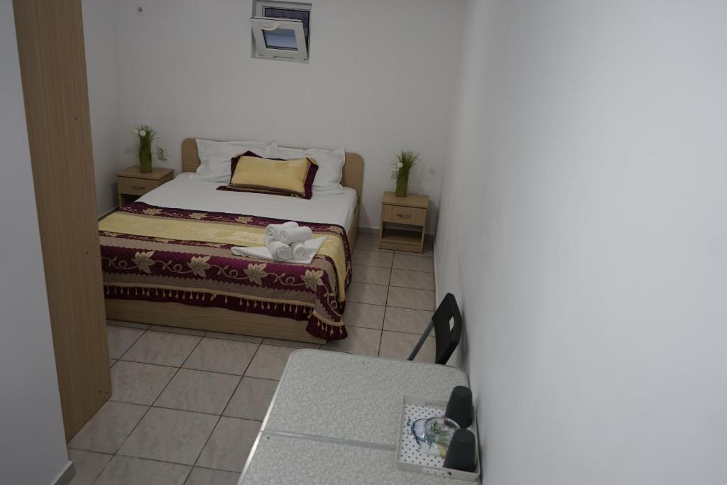 Postel nebo postele na pokoji v ubytování VILA APROAPE DE MARE/ LA CASTEL
