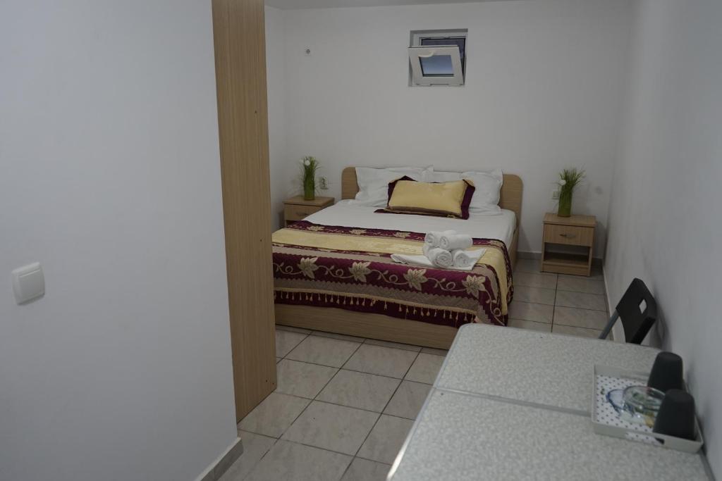 Postel nebo postele na pokoji v ubytování VILA APROAPE DE MARE/ LA CASTEL