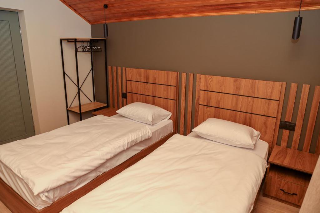 Postel nebo postele na pokoji v ubytování Getap