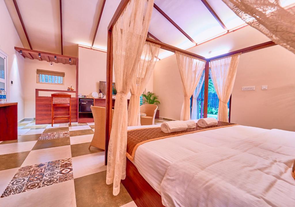 Postel nebo postele na pokoji v ubytování M Cafe Private Pool Villa By VOYE HOMES