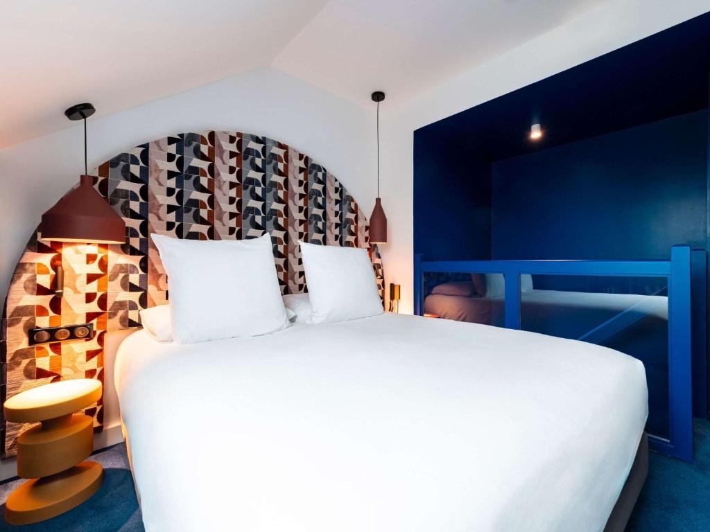 Postel nebo postele na pokoji v ubytování Mercure Quiberon Hotel