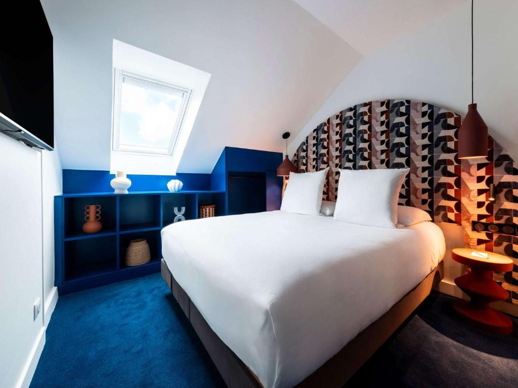 Postel nebo postele na pokoji v ubytování Mercure Quiberon Hotel