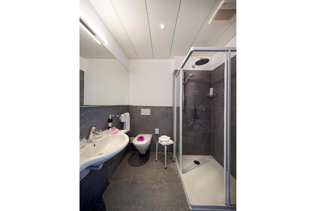 Koupelna v ubytování Hotel Stella SA