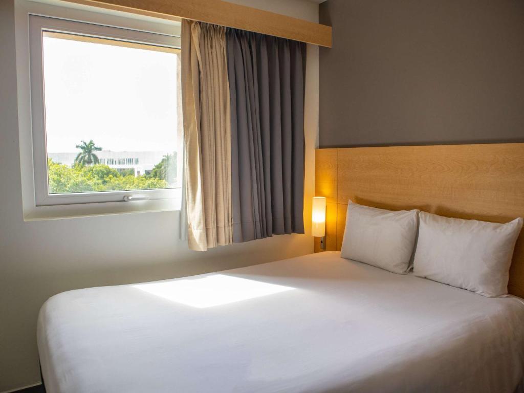 Cama o camas de una habitación en Ibis Merida