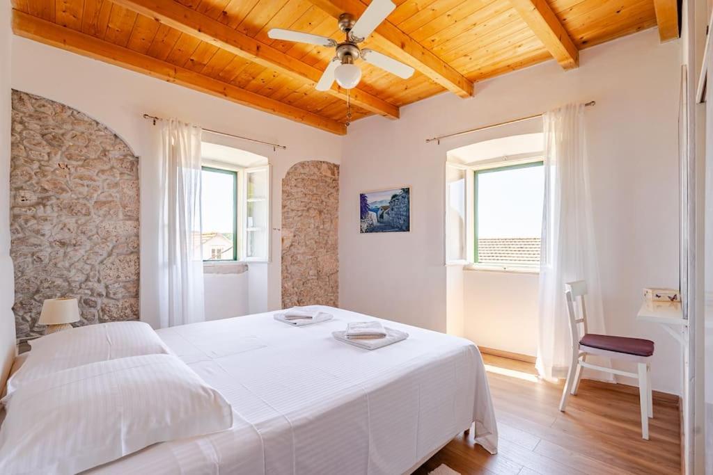 Cama ou camas em um quarto em Pinta Apartments