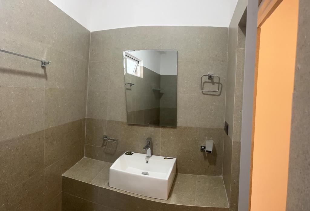 Koupelna v ubytování Viyanga Homestay