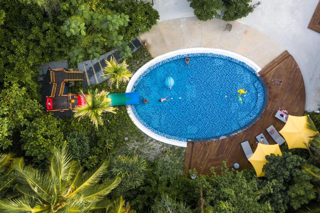 Bazén v ubytování Pullman Maldives Maamutaa - All-Inclusive Resort - 50 percent off Transfers - kids below 12 years old can dine free nebo v jeho okolí