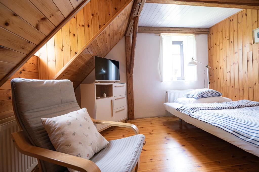 Postel nebo postele na pokoji v ubytování Penzion Statek u Rajtrů