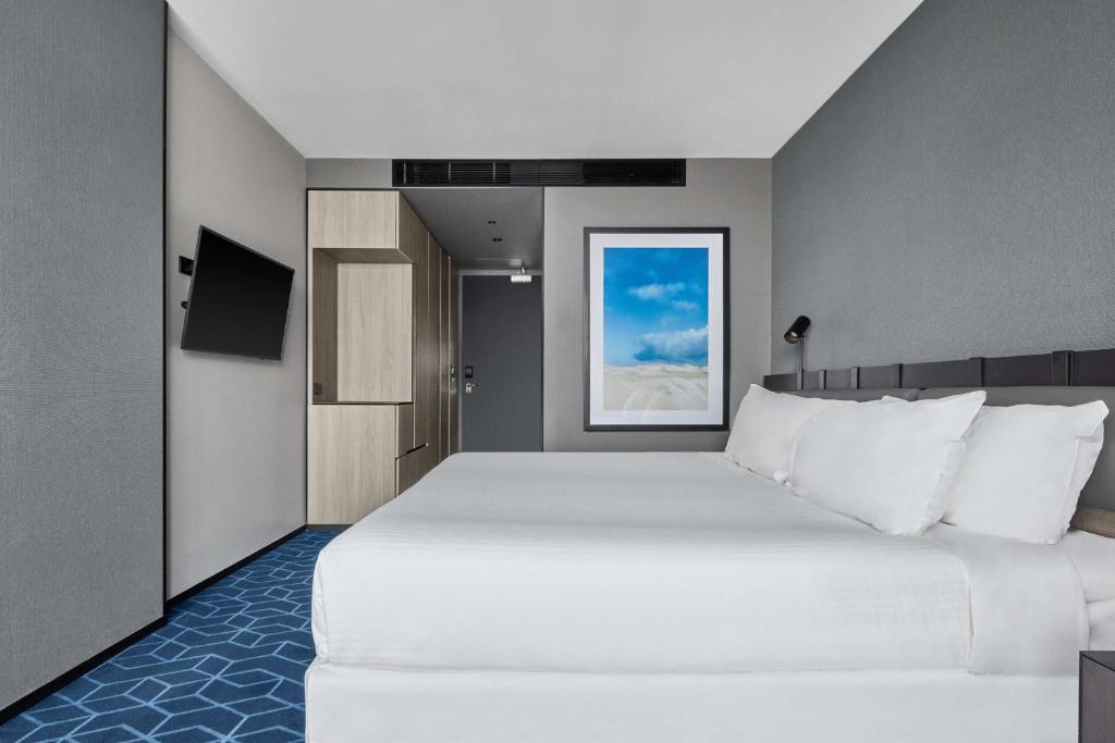 Vibe Hotel Melbourne Docklands - Luxe Kamer - Koning