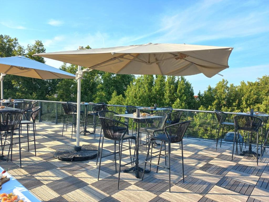 Балкон или терраса в Dali Hôtel Perpignan - Restaurant