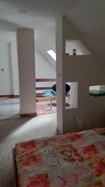 Posteľ alebo postele v izbe v ubytovaní Borostyán Vendégház