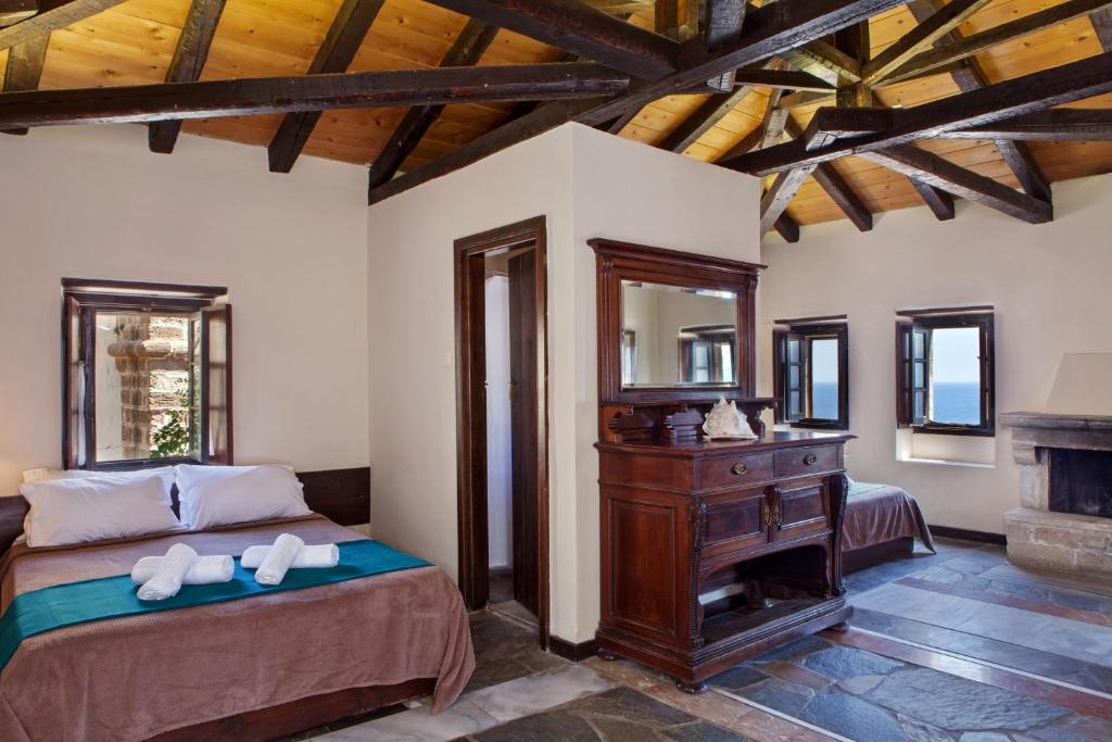 Postel nebo postele na pokoji v ubytování Byzantino Boutique Hotel