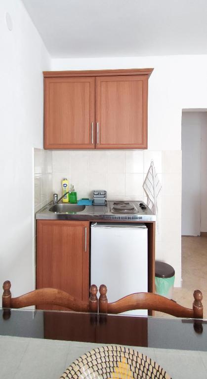 Kuchyň nebo kuchyňský kout v ubytování Zlatni Pijesak - Apartmani Čanj