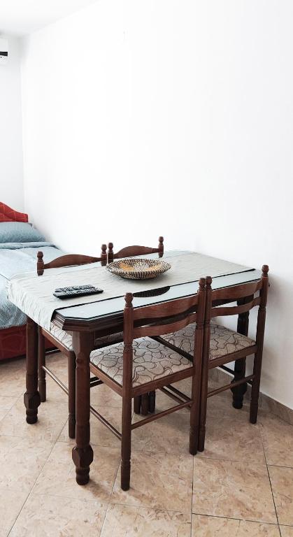 Postel nebo postele na pokoji v ubytování Zlatni Pijesak - Apartmani Čanj