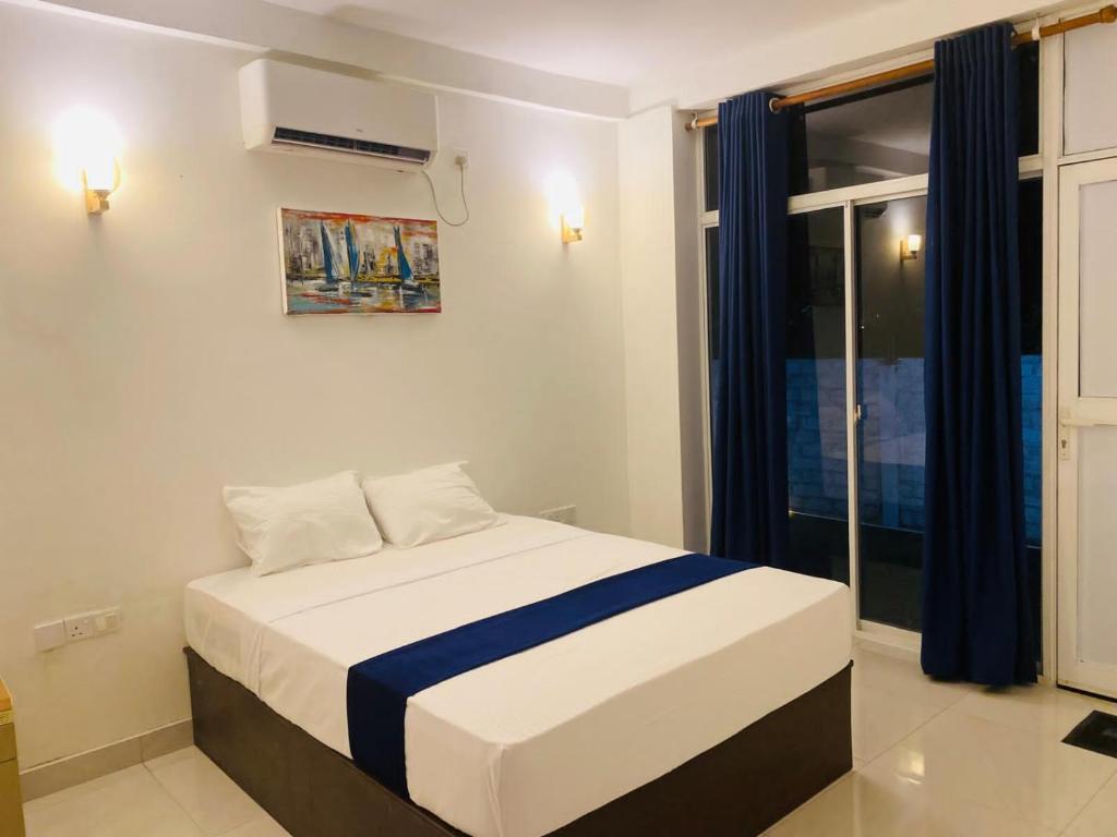 Postel nebo postele na pokoji v ubytování Numaaya Resorts
