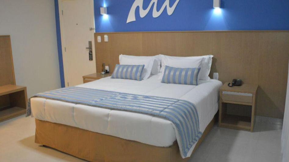 Cama ou camas em um quarto em Real Classic Bahia Hotel