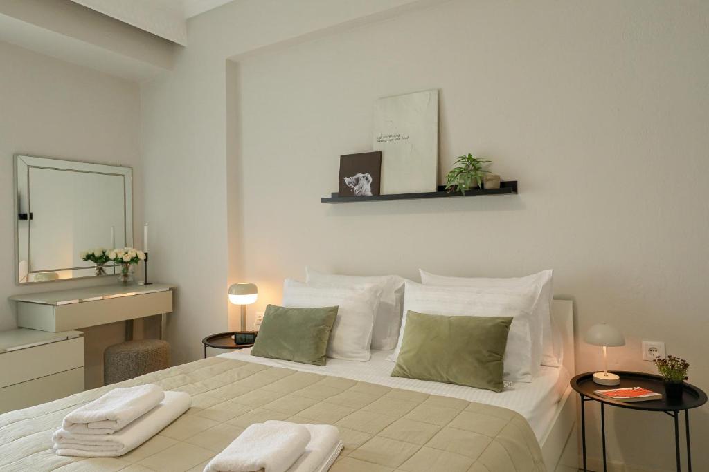 Postel nebo postele na pokoji v ubytování Freya Apartments