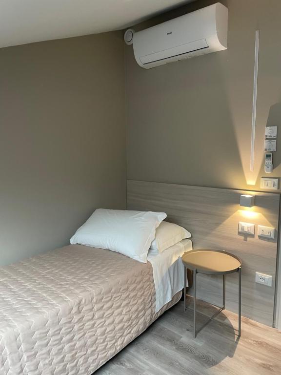 Postel nebo postele na pokoji v ubytování Hotel Principe