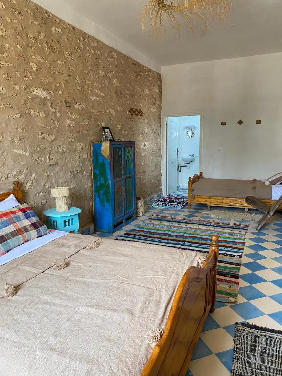 Postel nebo postele na pokoji v ubytování Adam house