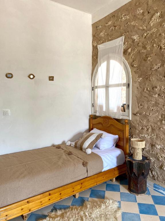 Postel nebo postele na pokoji v ubytování Adam house