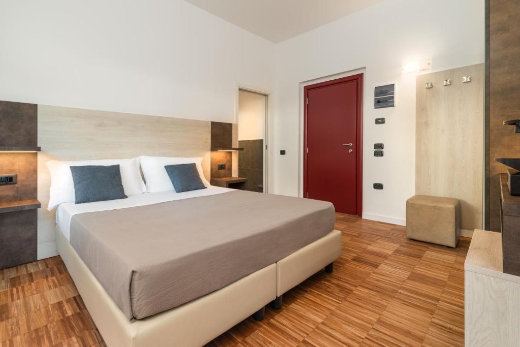 Postel nebo postele na pokoji v ubytování Residence Al Frantoio