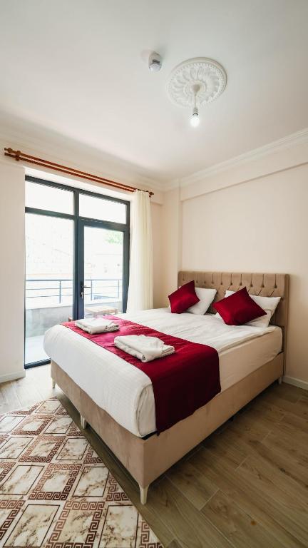 Postel nebo postele na pokoji v ubytování Cappadocia Ürgüp Apart Hotel