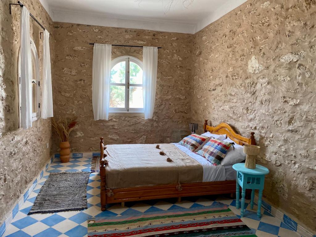 Postel nebo postele na pokoji v ubytování Adam house