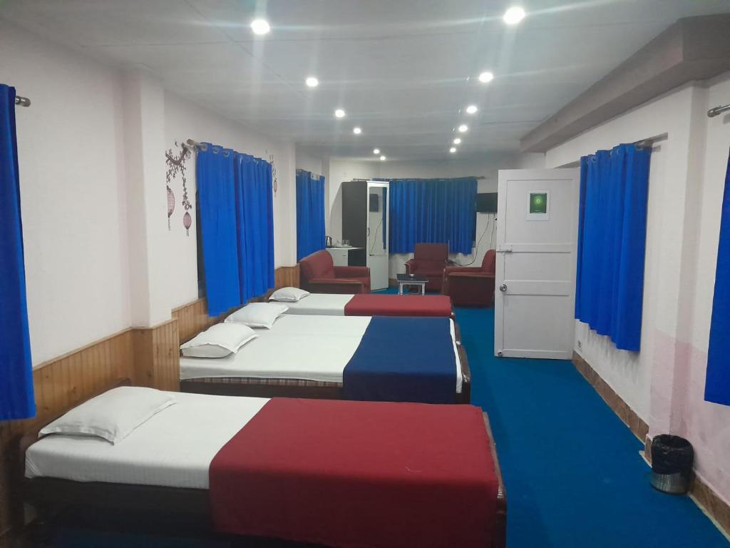 Postel nebo postele na pokoji v ubytování Hotel Paradiso