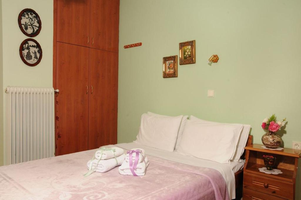 Postel nebo postele na pokoji v ubytování Chrysoula's Guests