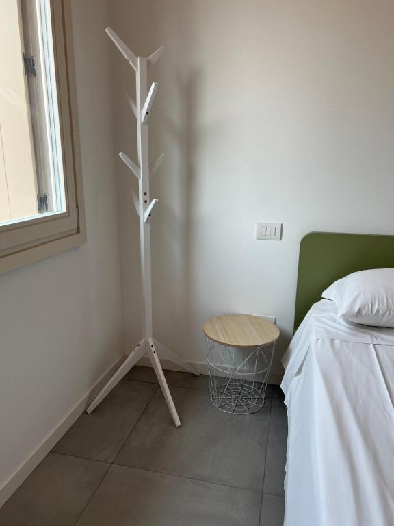 Postel nebo postele na pokoji v ubytování Le Casette B - Camera con bagno