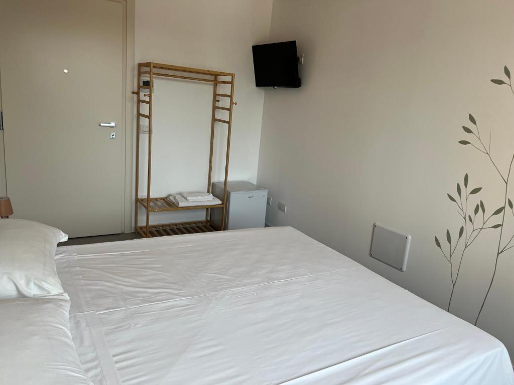Postel nebo postele na pokoji v ubytování Le Casette B - Camera con bagno